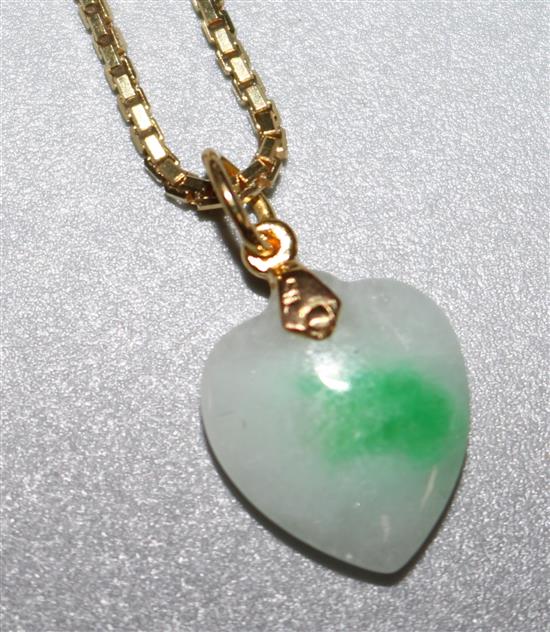 A 14ct gold mounted heart shaped jade pendant on an 18ct gold box link chain, chain 17in.